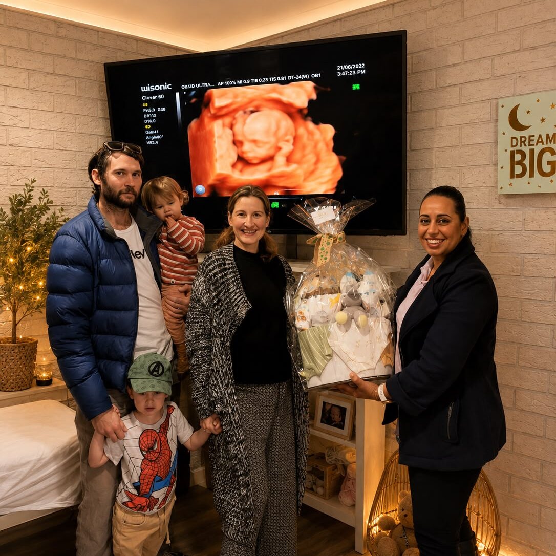 A family together in the UBM Scans clinic during a 3D scan